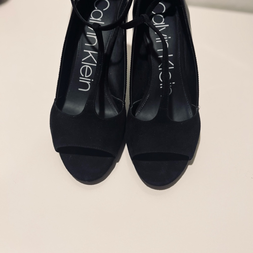 Calvin Klein open toe black suede/leather spike heel shoes.